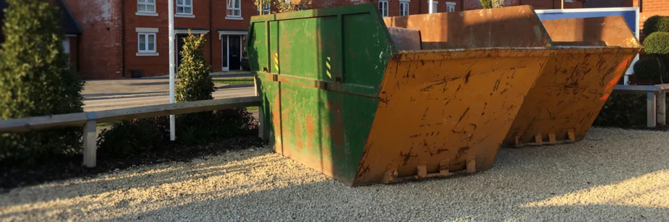 two green skips